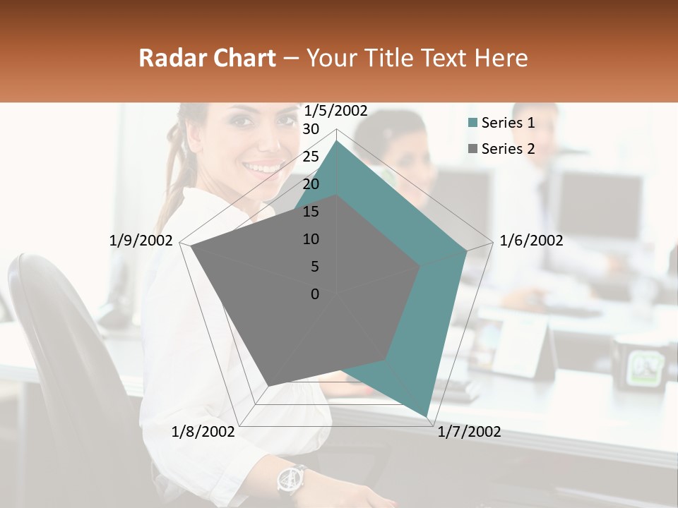 A Woman Sitting At A Desk In An Office PowerPoint Template