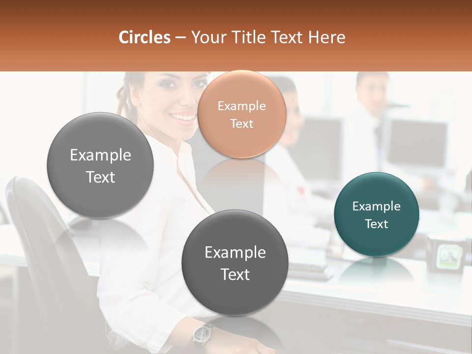 A Woman Sitting At A Desk In An Office PowerPoint Template