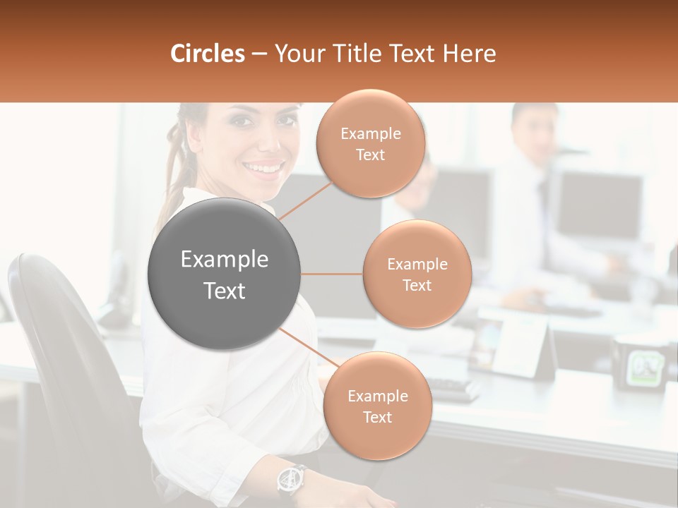 A Woman Sitting At A Desk In An Office PowerPoint Template