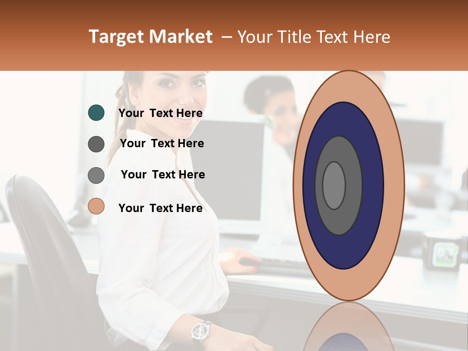 A Woman Sitting At A Desk In An Office PowerPoint Template