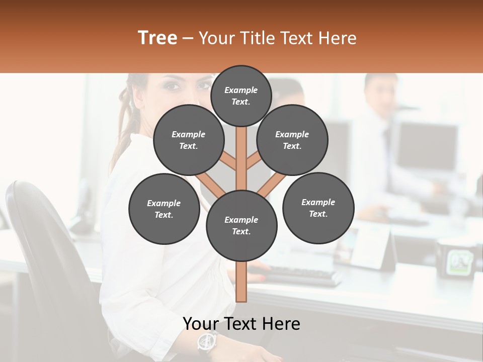 A Woman Sitting At A Desk In An Office PowerPoint Template