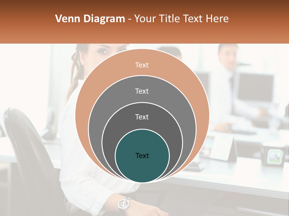 A Woman Sitting At A Desk In An Office PowerPoint Template