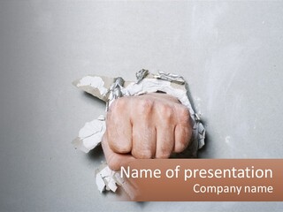 A Fist Punching Through A Piece Of Paper PowerPoint Template