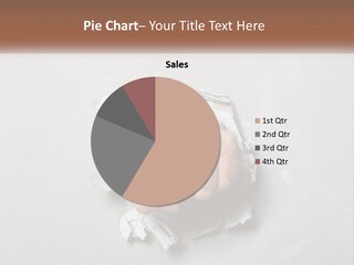 A Fist Punching Through A Piece Of Paper PowerPoint Template