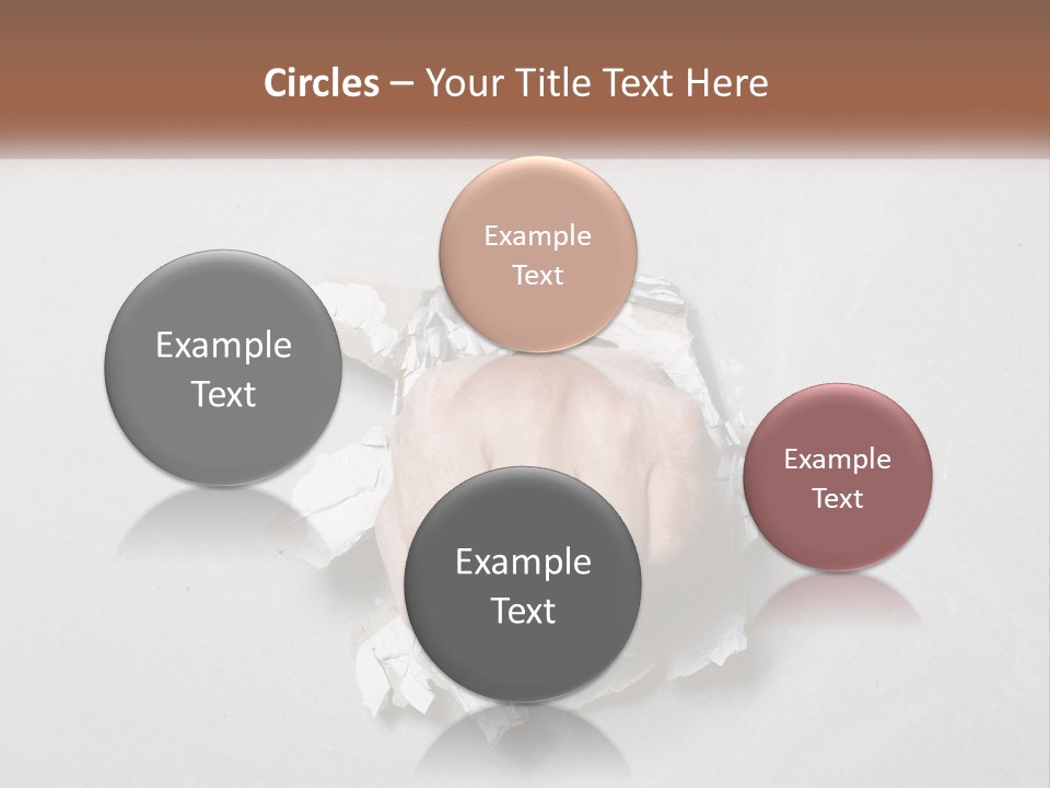 A Fist Punching Through A Piece Of Paper PowerPoint Template