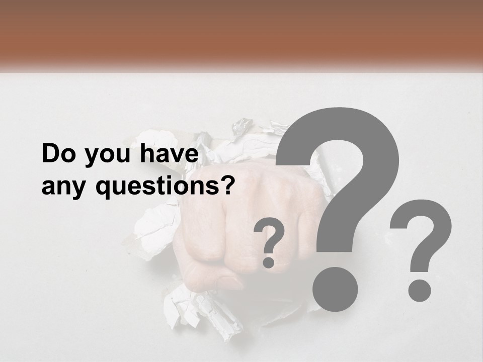 A Fist Punching Through A Piece Of Paper PowerPoint Template