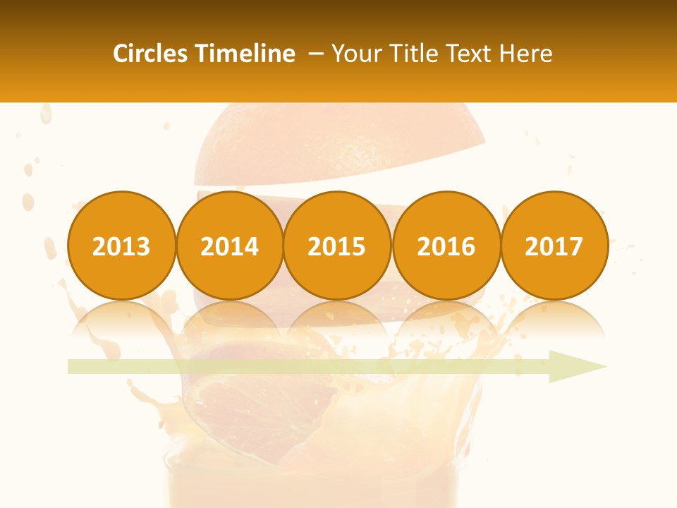 An Orange Is Falling Into A Glass Of Orange Juice PowerPoint Template