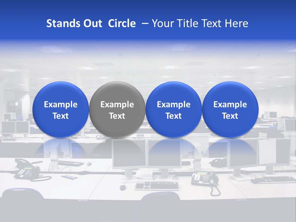 A Room Full Of Computer Monitors And Keyboards PowerPoint Template