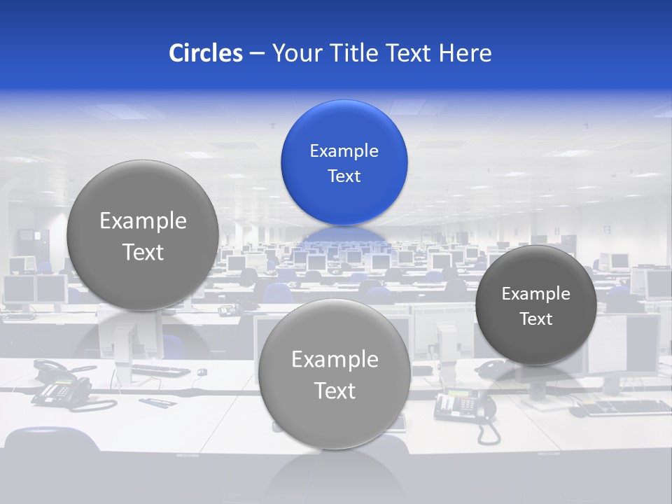 A Room Full Of Computer Monitors And Keyboards PowerPoint Template