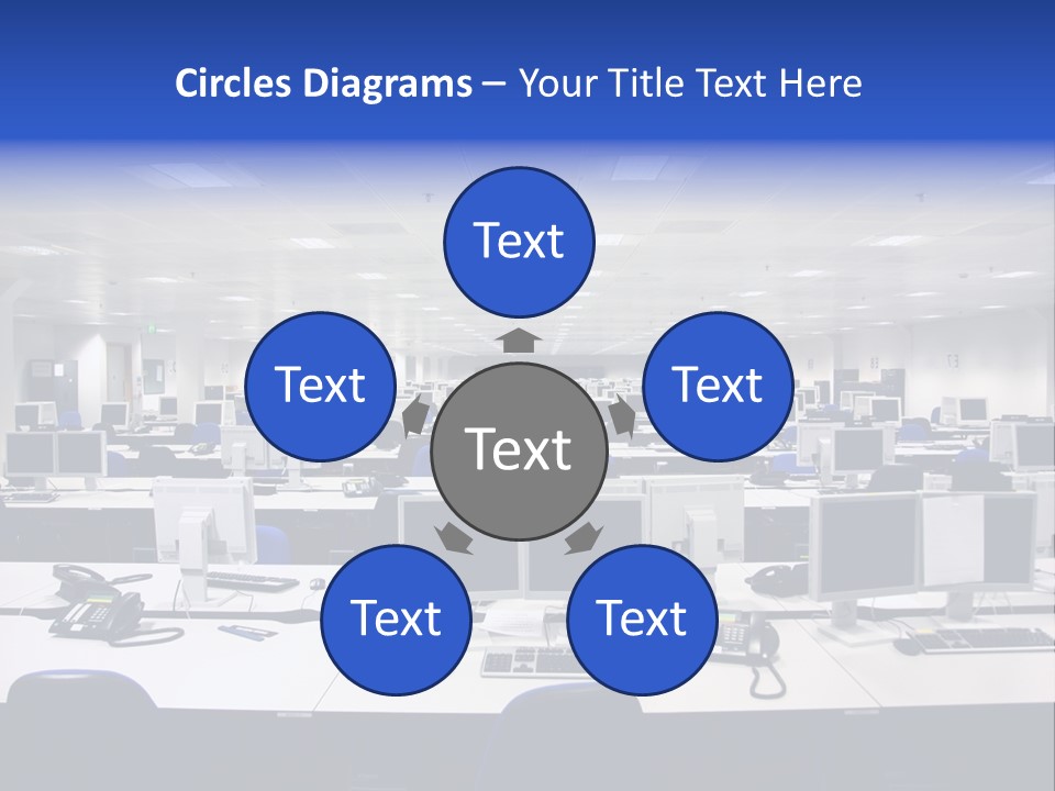 A Room Full Of Computer Monitors And Keyboards PowerPoint Template