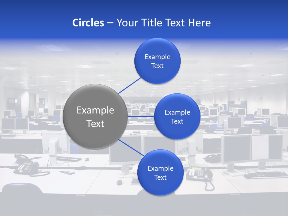A Room Full Of Computer Monitors And Keyboards PowerPoint Template