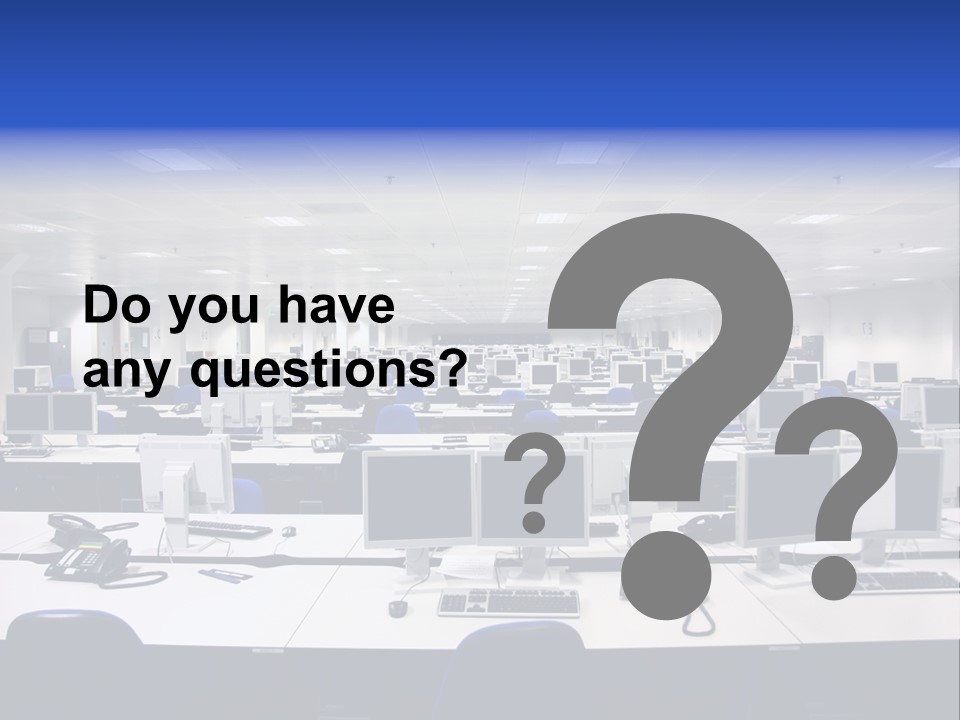 A Room Full Of Computer Monitors And Keyboards PowerPoint Template