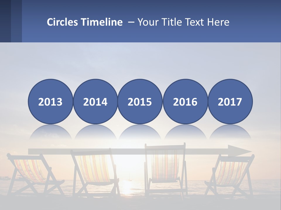 Two Chairs Sitting On A Beach With The Sun Setting In The Background PowerPoint Template