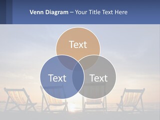Two Chairs Sitting On A Beach With The Sun Setting In The Background PowerPoint Template
