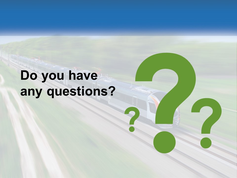 A Train Traveling Down A Track With Trees In The Background PowerPoint Template