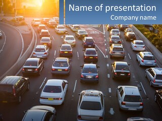 A Highway Filled With Lots Of Traffic At Sunset PowerPoint Template
