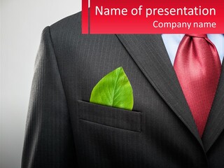 A Man In A Suit With A Green Leaf In His Pocket PowerPoint Template