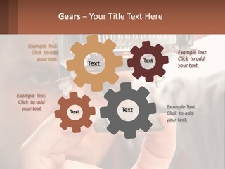 A Man Holding Up A Piece Of Metal In Front Of His Face PowerPoint Template