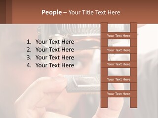 A Man Holding Up A Piece Of Metal In Front Of His Face PowerPoint Template