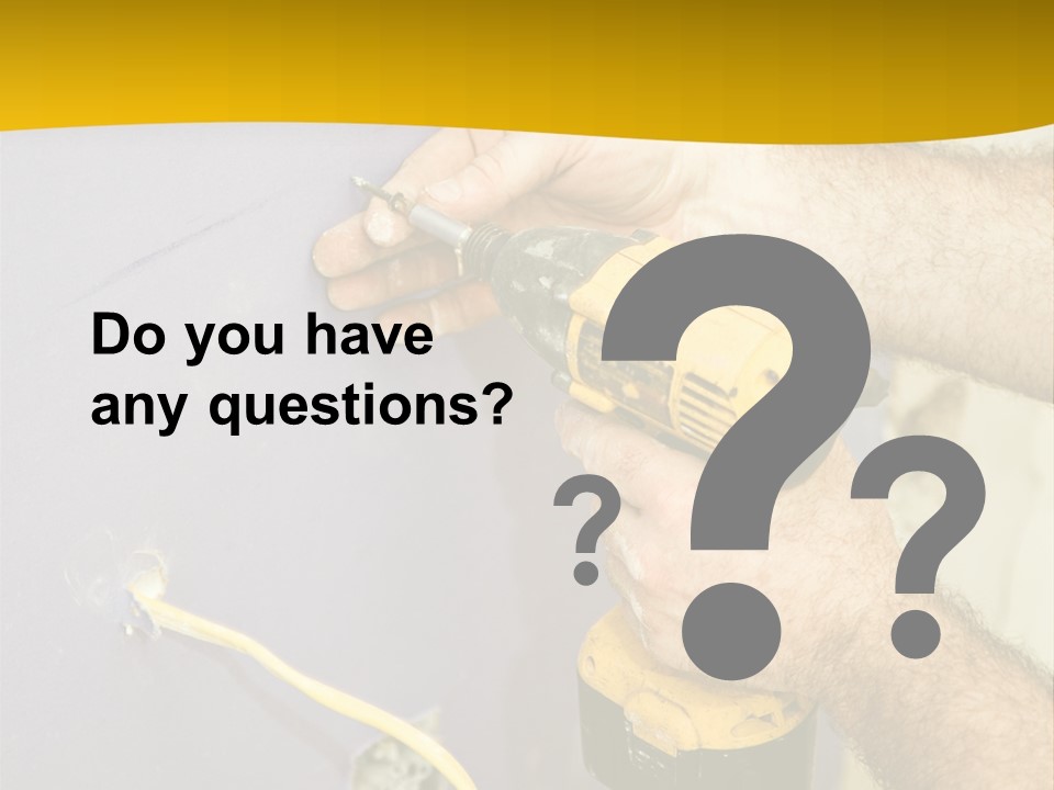 A Man Is Using A Power Drill On A Wall PowerPoint Template