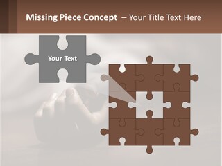 A Person Laying On The Floor With Their Hands On The Table PowerPoint Template