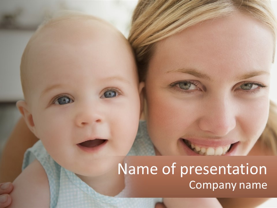 A Woman Holding A Baby In Her Arms PowerPoint Template