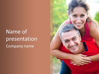 A Man Holding A Woman In His Arms PowerPoint Template