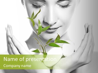 A Woman Holding A Plant In Her Hands PowerPoint Template