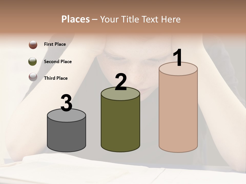 A Young Boy Sitting At A Desk With His Hands On His Head PowerPoint Template