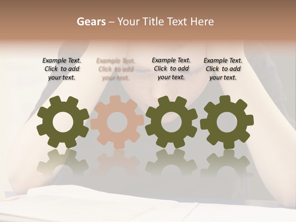 A Young Boy Sitting At A Desk With His Hands On His Head PowerPoint Template