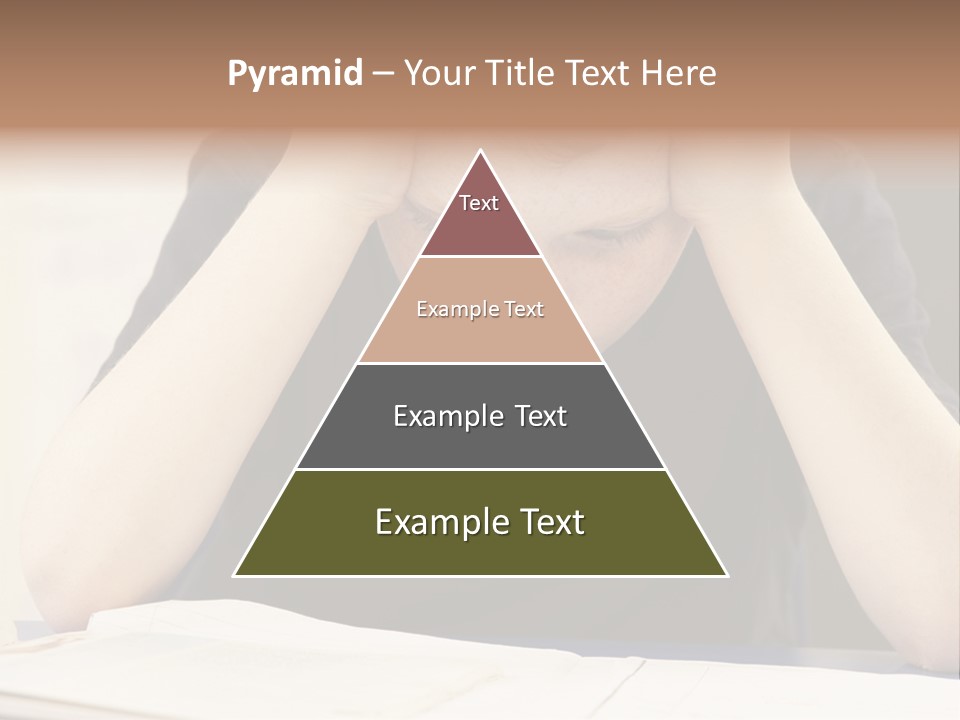 A Young Boy Sitting At A Desk With His Hands On His Head PowerPoint Template