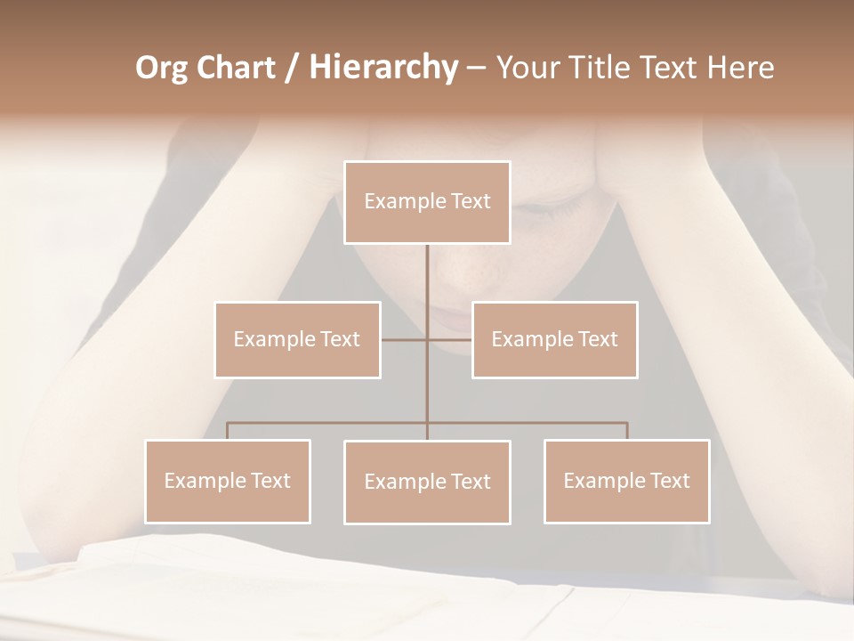 A Young Boy Sitting At A Desk With His Hands On His Head PowerPoint Template