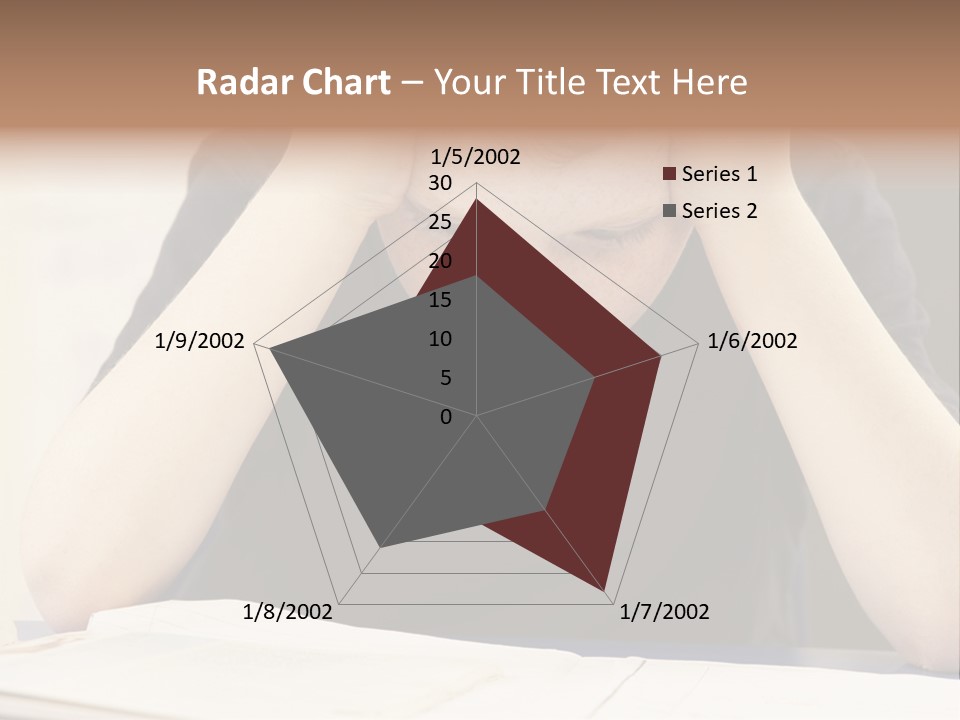 A Young Boy Sitting At A Desk With His Hands On His Head PowerPoint Template
