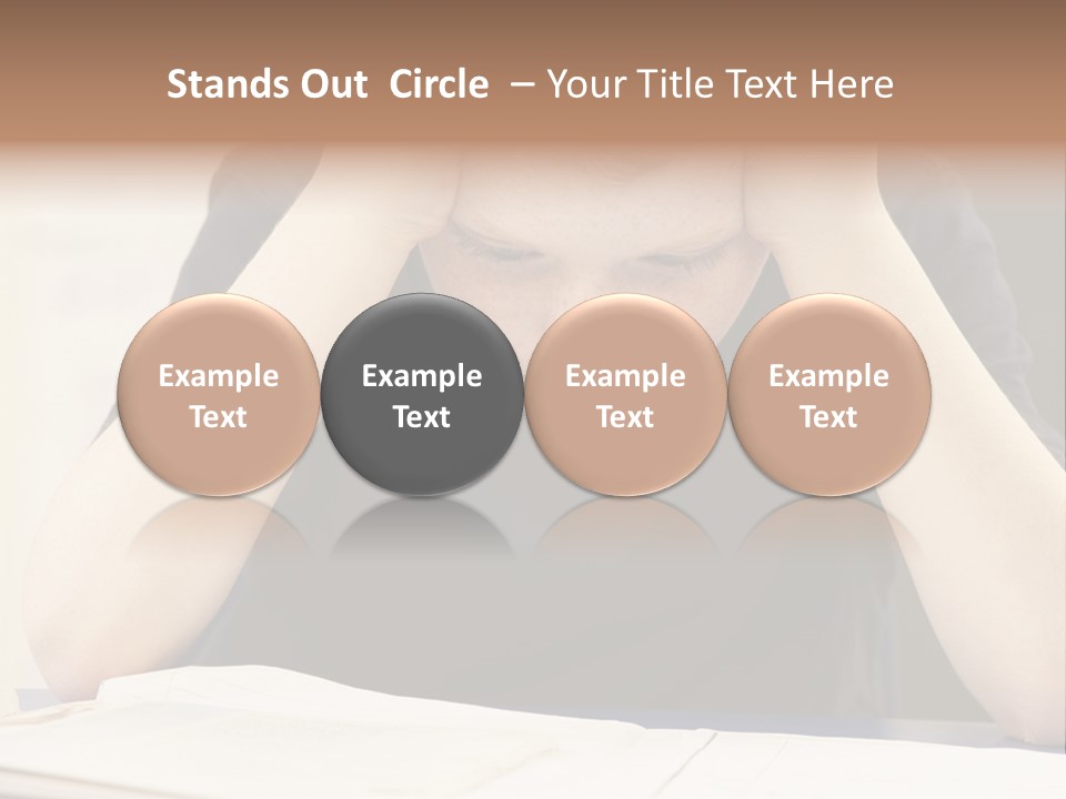 A Young Boy Sitting At A Desk With His Hands On His Head PowerPoint Template