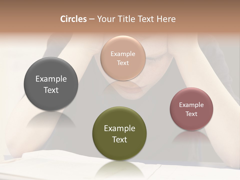 A Young Boy Sitting At A Desk With His Hands On His Head PowerPoint Template