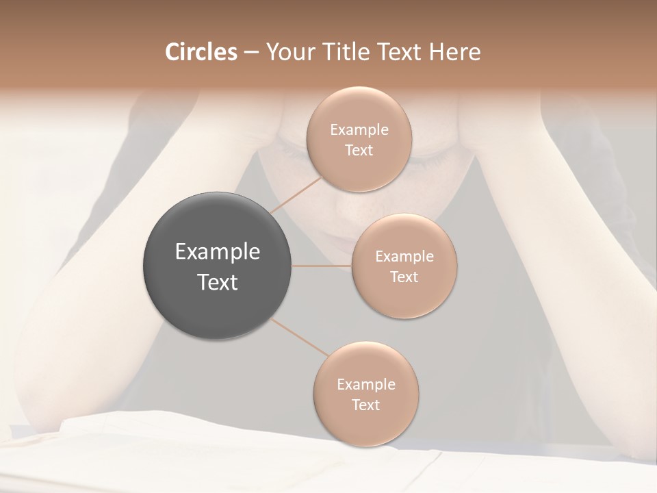 A Young Boy Sitting At A Desk With His Hands On His Head PowerPoint Template