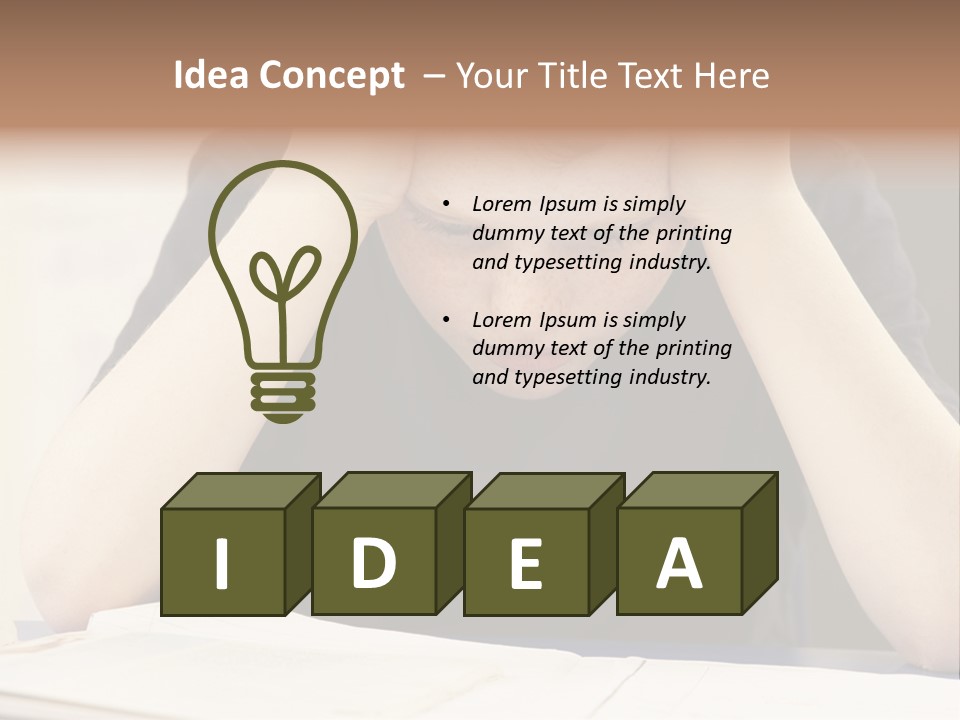 A Young Boy Sitting At A Desk With His Hands On His Head PowerPoint Template