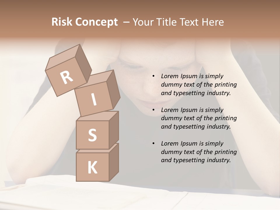 A Young Boy Sitting At A Desk With His Hands On His Head PowerPoint Template