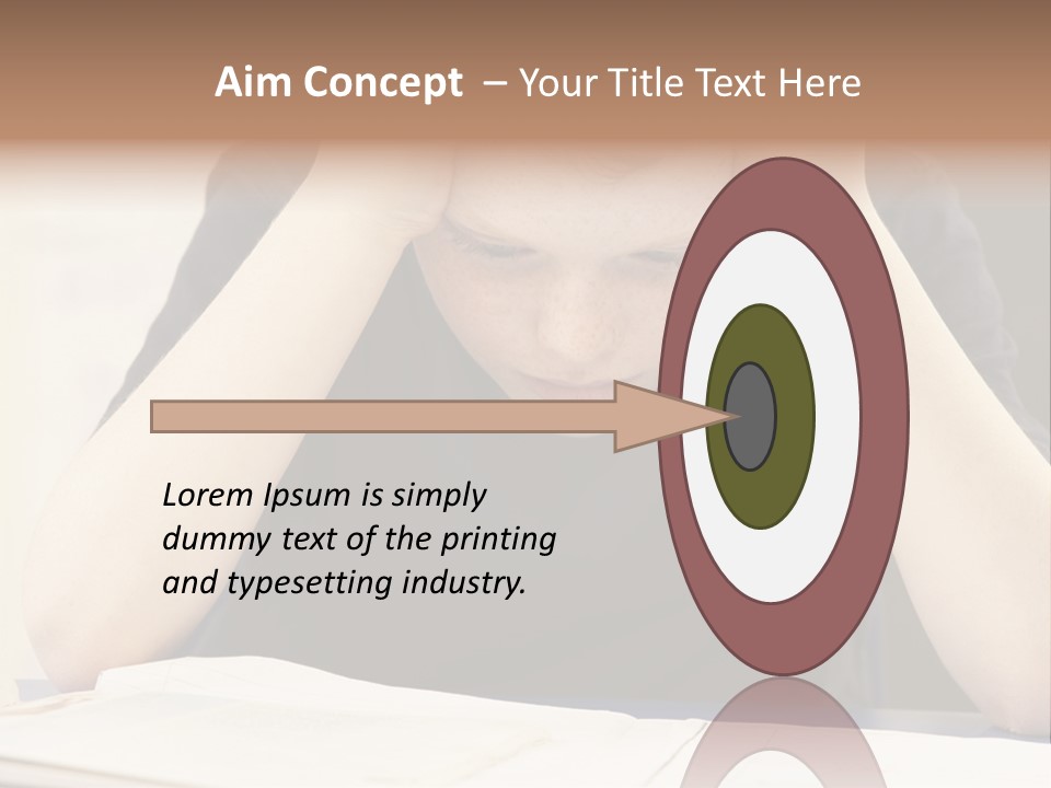 A Young Boy Sitting At A Desk With His Hands On His Head PowerPoint Template