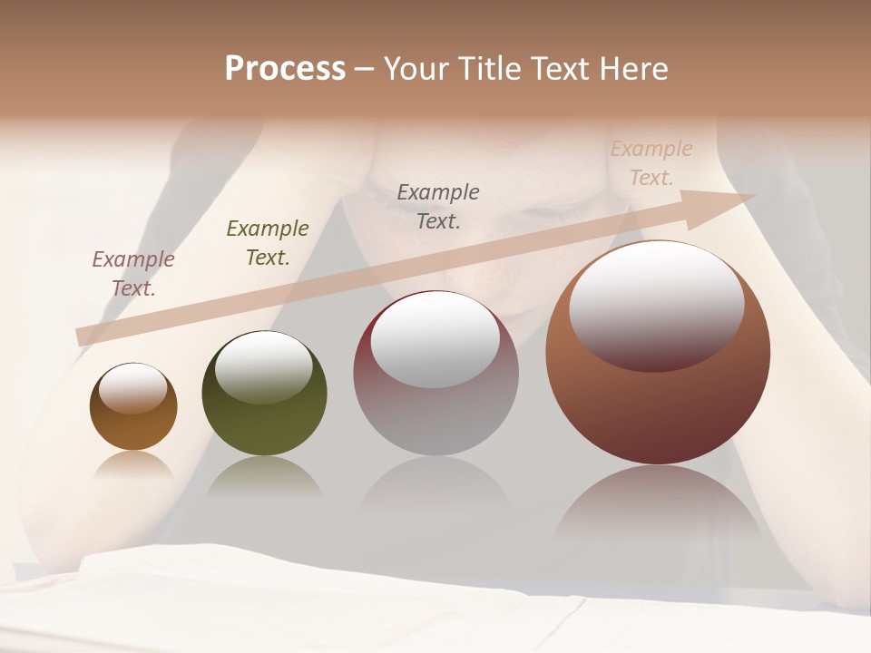 A Young Boy Sitting At A Desk With His Hands On His Head PowerPoint Template