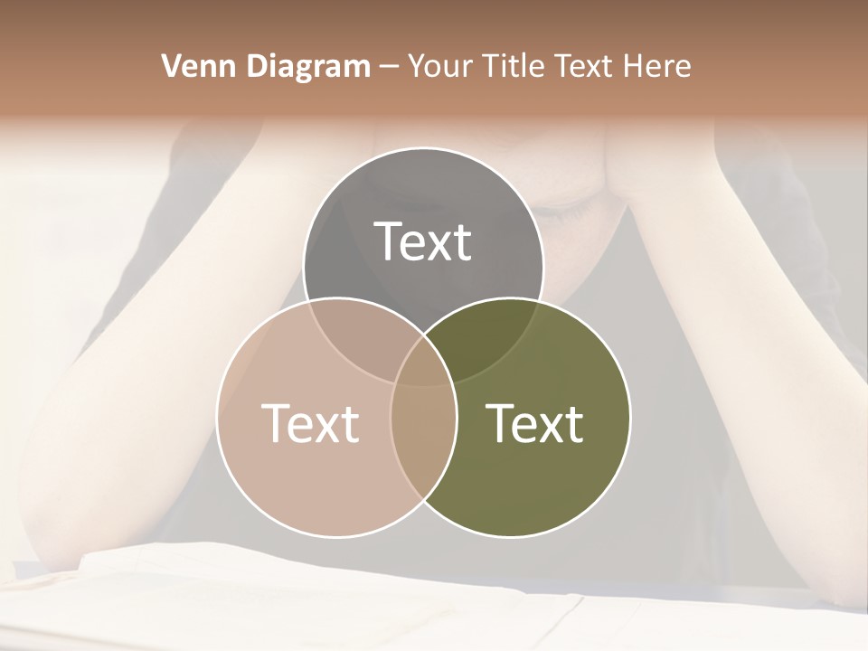 A Young Boy Sitting At A Desk With His Hands On His Head PowerPoint Template