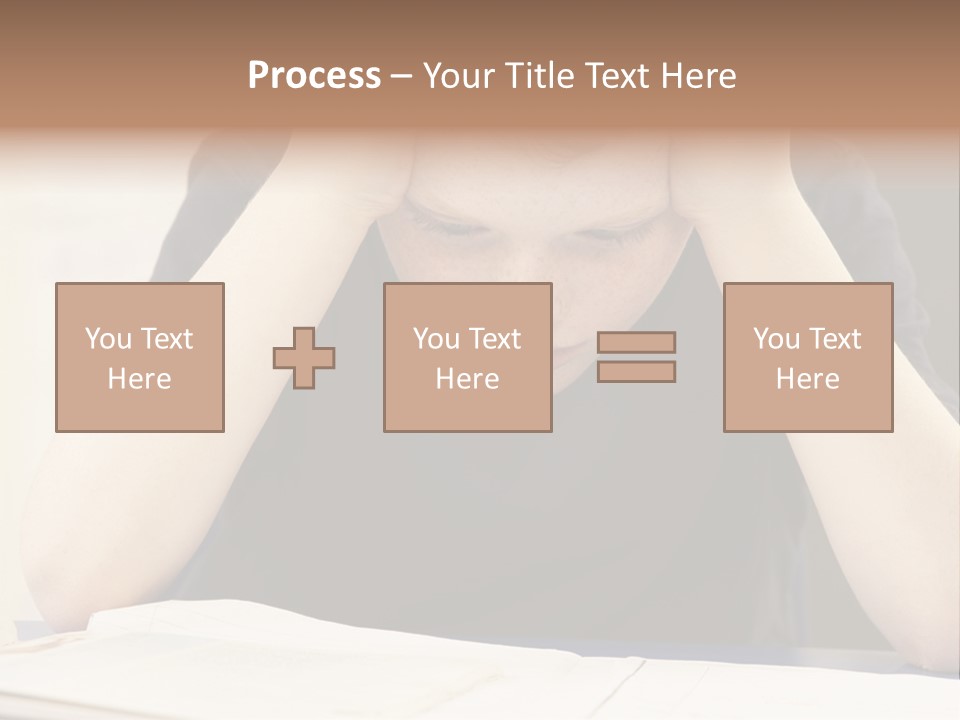 A Young Boy Sitting At A Desk With His Hands On His Head PowerPoint Template