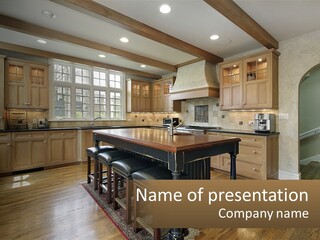 A Large Kitchen With Wooden Cabinets And A Center Island PowerPoint Template
