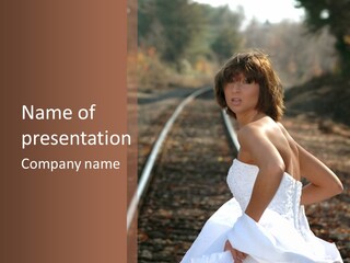 A Woman In A White Dress Standing On Train Tracks PowerPoint Template