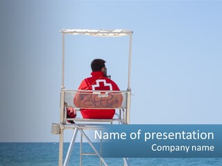 A Man Sitting On A Life Guard Chair On The Beach PowerPoint Template