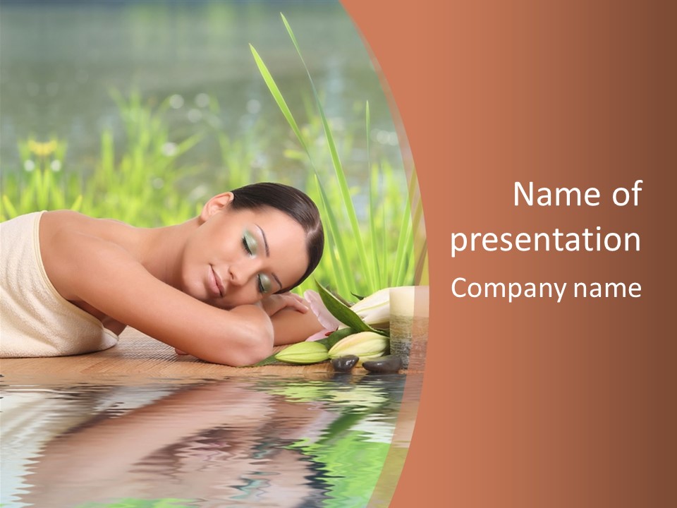A Woman Laying On The Ground Next To A Body Of Water PowerPoint Template