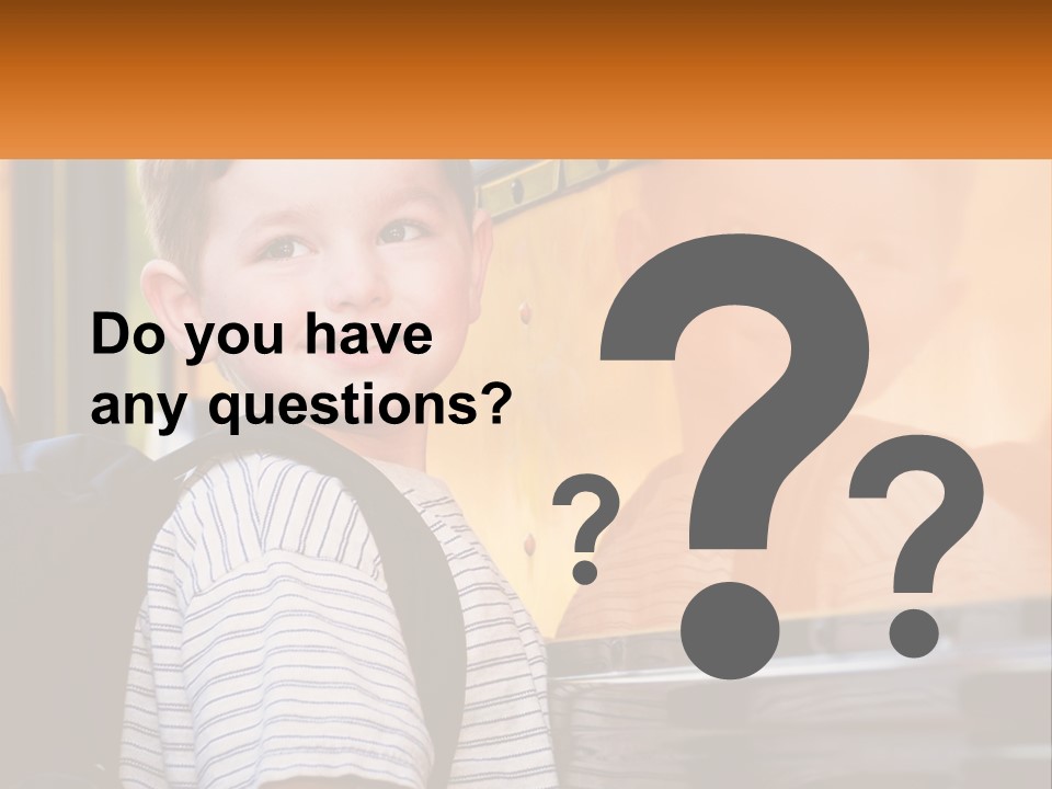 A Young Boy Is Standing In Front Of A School Bus PowerPoint Template