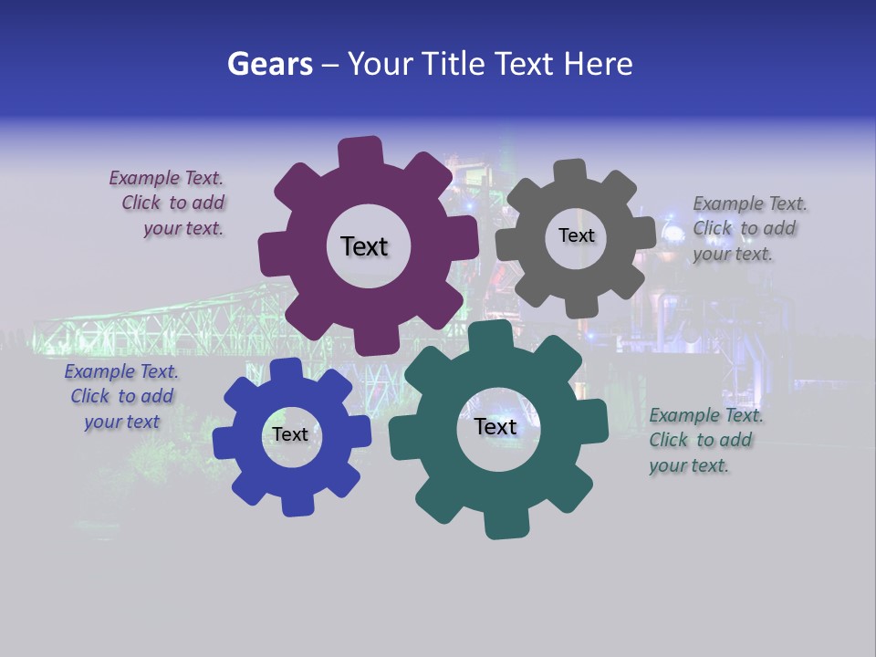 A Power Plant Lit Up At Night With Green And Blue Lights PowerPoint Template