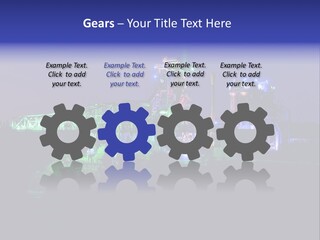 A Power Plant Lit Up At Night With Green And Blue Lights PowerPoint Template