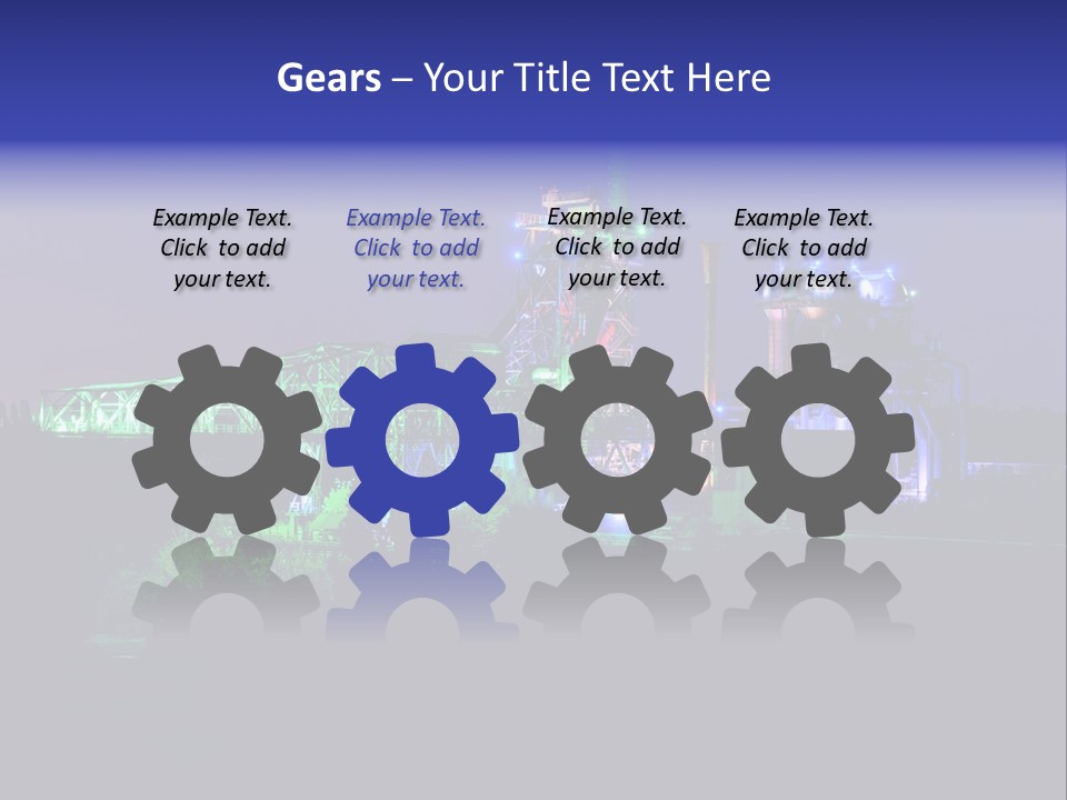 A Power Plant Lit Up At Night With Green And Blue Lights PowerPoint Template